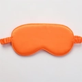 Vibrant orange silk sleep eye mask with elastic strap for light blocking comfort - Orange