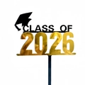 Macro detail of Class of 2026 graduation cake topper with gold acrylic numbers and black cap - Black Mortarboard 2026