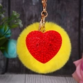Yellow faux fur pompom keychain with a red rhinestone heart and golden metal clasp - Heart Red + Beige Pom Pom