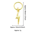 Detailed view of a gold lightning bolt charm pendant for DIY hair braiding accessories - Flash