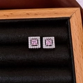 Detailed view of square pink zircon stud earrings with silver plating and halo diamonds - Pink