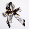 Elegant nautical print skinny scarf tied in a bow with black and gold chain pattern - S07-Black White Nautical Chain