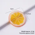 Realistic yellow PVC lemon slice keychain accessory measuring 6cm with textured pulp - 6cm Medium Orange Lemon Slice - No Buckle