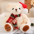 Beige Christmas teddy bear plush with red hat and green scarf on soft home background - 20cm (With Santa Hat) / Red Xmas Scarf Off-white Bear