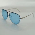 Aviator sunglasses with light blue translucent lenses and silver metal rivet accents - Silver Frame Blue Lens