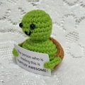 Handmade crochet green turtle plush with motivational quote card on lace background - Turtle With Card