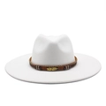 White flat top wide brim fedora hat with brown leather band and golden feather pin - White