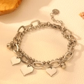 Close-up of silver double-layer bracelet with pixel heart charms and steel beads - Steel Style (I701)