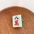 Cute 3D Mahjong tile hair clip featuring an 8-Wan design in white and green finish - Ba Wan (8 of Characters)