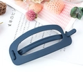 Matte dark blue hollowed hair clip on decorative background with dried flowers - Navy Blue