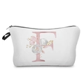 Close-up of pink floral letter F print on a white cosmetic bag with black zipper - Letter F