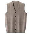 Macro detail of the brown V-neck knitted vest showing fine check pattern and button texture - Camel