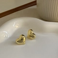 Elegant gold heart stud earrings on white ceramic dish for a chic vintage aesthetic - Gold Polished Heart Style (51#)