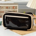Detail of black large-capacity pencil case featuring a clear PVC window and canvas material - Black