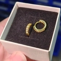 Elegant gold hoop earrings with sparkling clear crystals in a small jewelry gift box - Gold