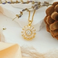 Elegant gold sunflower necklace with sparkling zircon petals on white stone background - Rotating Sunflower (XL2539)