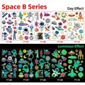 Luminous space theme temporary tattoos for kids with astronaut and rocket designs - Luminous Space Series B