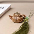 Carved sandalwood teapot pendant featuring lotus motifs and elegant green silk tassels - Approx. 2.8x4.5cm / Green Sandalwood Pumpkin Pot Style - No Aroma Pill