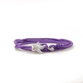 Detail of purple woven Milan cord bracelet with a silver shark charm on white background - Purple Cord Silver Whale