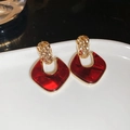 Close-up of vintage geometric red resin earrings with hammered gold metal details on ceramic - 69# Silver Earring Post - Gold - Red