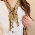 Close-up of ginger yellow floral silk scarf with scalloped black edges and flower pattern - Ginger Hand-painted Floral Wavy Edge Scarf Waist Decor