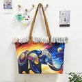 Detail of a colorful elephant print tote bag with white fringe and leather straps - Bohemian Elephant Print / 47x35x13cm