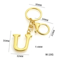 Golden uppercase letter U keychain charm with lobster clasp and round key ring - Letter U