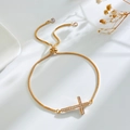 Elegant gold cross bracelet with rhinestones and adjustable pull-chain closure - Gold Cross Zirconia Chain