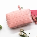 Pink velvet quilted cosmetic bag with large checkered pattern and secure zipper closure - Pink