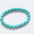 8mm gradient turquoise-style bead bracelet with round polished cat eye glass finish - Black Line Turquoise