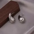 Polished silver water drop stud earrings with a minimalist mirror finish for women - E-049---Platinum