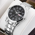 Close-up of ORUSS quartz watch with luminous markers and date display on a white pillow - Silver Black Dial