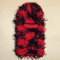 Detail of red and black fuzzy distressed balaclava with unique fringed knit texture - One Size / Camo Red