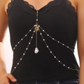 Detail of layered gold body chain with white pearls and sun pendant with baroque pearl - Sun Style (05 KC Gold)