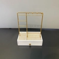 Golden jewelry display stand with white wood base and drawer for ring necklace storage - Jewelry Stand with Drawer