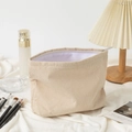 Beige corduroy makeup bag with zipper closure and soft inner lining for organization - Beige