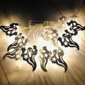 Ghost-shaped LED string lights with warm yellow glow on a rustic wooden background - White Ghost-Warm White / 3m 20 LEDs - Battery