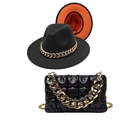 Detail of black wool fedora with orange brim and quilted cloud bag with gold chains - M (56-58cm) / Black and Orange Red