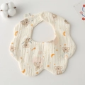 Close-up of muslin cotton baby bib with cute koala print and soft petal edge design - Gauze Flower Wrap - Starry Sky Raccoon