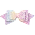 Close-up of a 5-inch glitter bow hair clip with pink, purple, and gold gradient shine - Colorful
