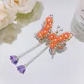 Silver butterfly hair clip with orange flowers, long tassels and purple charms - Orange Flower Tassel Butterfly / Orange