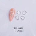 Detail view of 7.5x8mm hollow heart nail art charms in silver finish with beaded edges - Exquisite Beaded Hollow Style (MZH-8014) / 50 Pieces / Silver