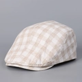Detail van de beige geruite platte pet van ademende lyocell en linnen mix stof - M(56-58cm) / Off-wit