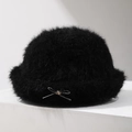 Close-up of black plush bucket hat featuring a delicate metal bow and beaded detail - Black