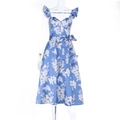 Detail of blue floral satin dress featuring a functional bow tie waistband and smooth texture - XS / Blue