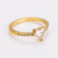 Detail of gold heart ring featuring a large clear zircon and side accent diamonds - Gold [White Zirconia]
