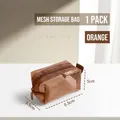 Mini orange mesh storage bag for cosmetics and stationery with durable top zipper - 8.5x5.5x5cm / Orange