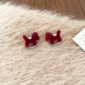 Detailed macro of a red flocked rocking horse earring with silver metal and zircon accents - 29# Flocked Rhinestone Rocking Horse Silver Earring Post Earrings (HE29310) / Red/Silver