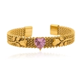 Detail of gold-plated rose bracelet with pink heart-shaped crystal on white background - Pink