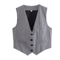 Détail d'un gilet à carreaux avec col en V, quatre boutons noirs et poches décoratives - Carreaux Noir et Blanc